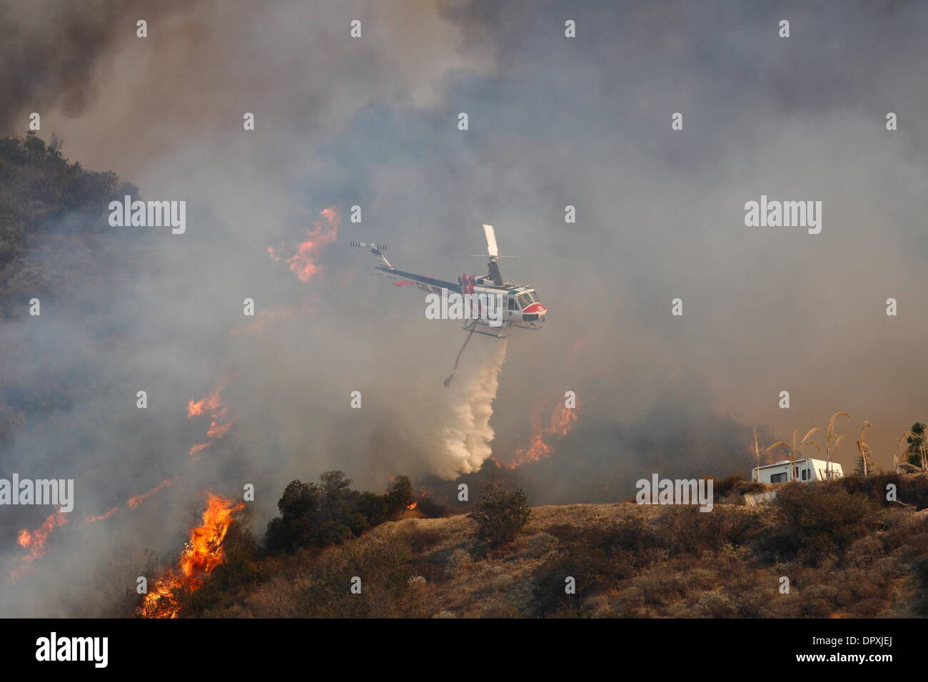 Glendora, California, USA. 16th January 2014. A large wildfire burns