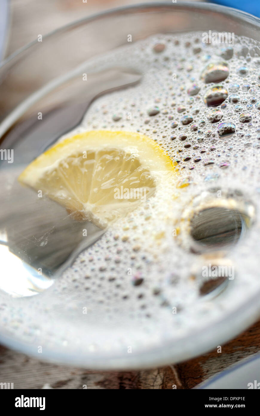 Lemon finger bowl Stock Photo Alamy