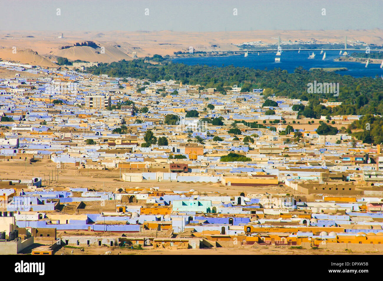 Blue houses in Nagaa Al Hamdlab neighborhood on west bank of the Nile River near Aswan, Egypt. Stock Photo