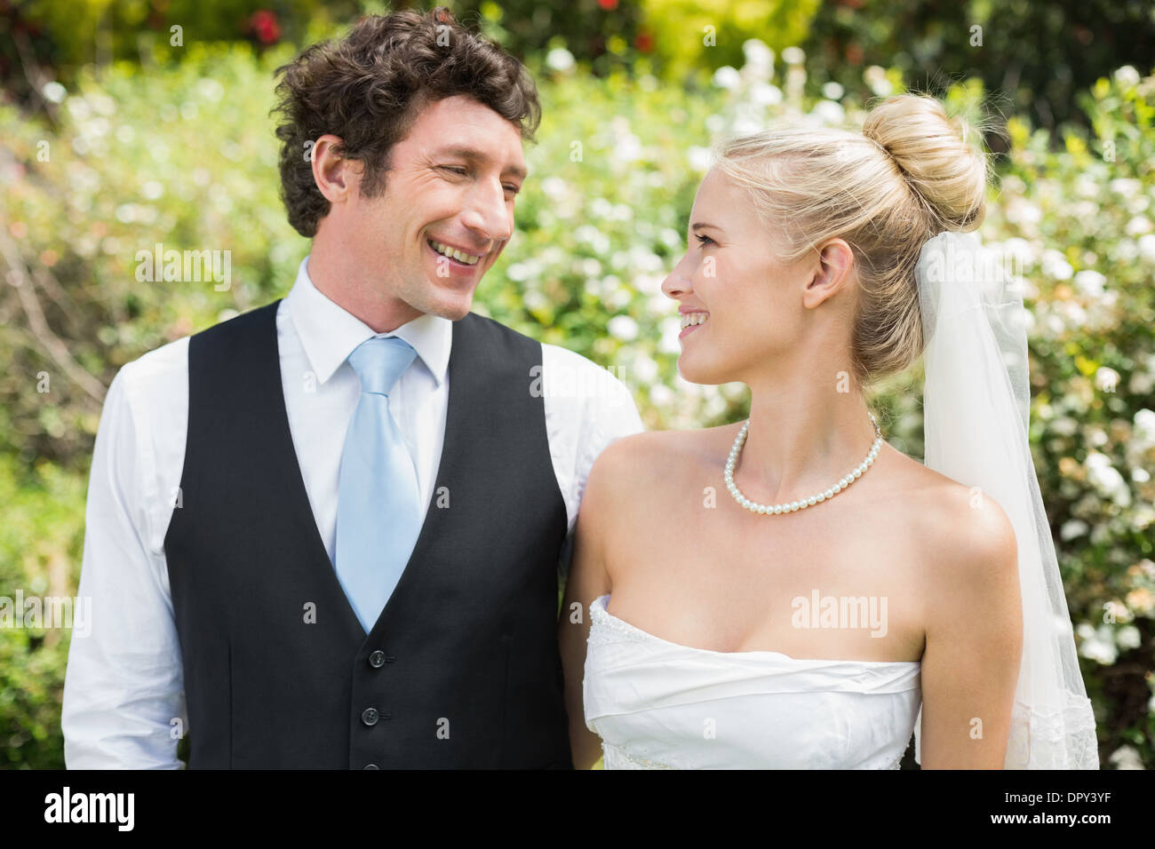 Happy young newlywed couple bride hi-res stock photography and images ...