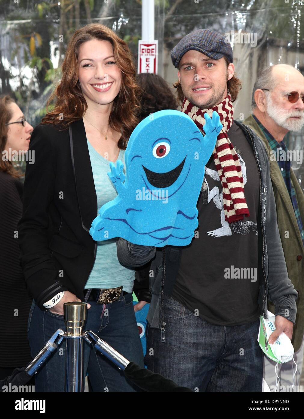 Mar 22, 2009 - Universal City, California, USA - Actor JESSE SPENCER & DATE arriving to the 'Monsters VS Aliens' Los Angeles Premiere held at the Gibson Amphitheatre. (Credit Image: Â© Lisa O'Connor/ZUMA Press) Stock Photo