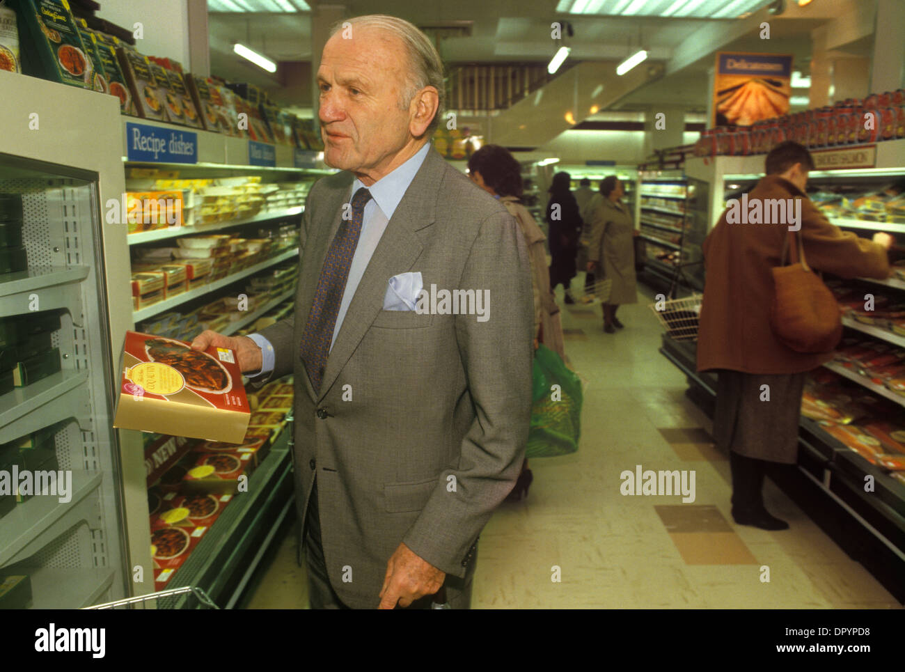 Lord Sieff, portrait Chairman of  Marks and Spencers in Oxford Street department store London 1980s  He is shopping in the Food Hall (2 July 1913 – 23 February 2001)  HOMER SYKES Stock Photo