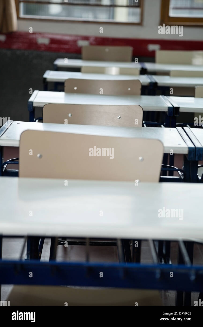 Empty Chairs At Desks Stock Photo