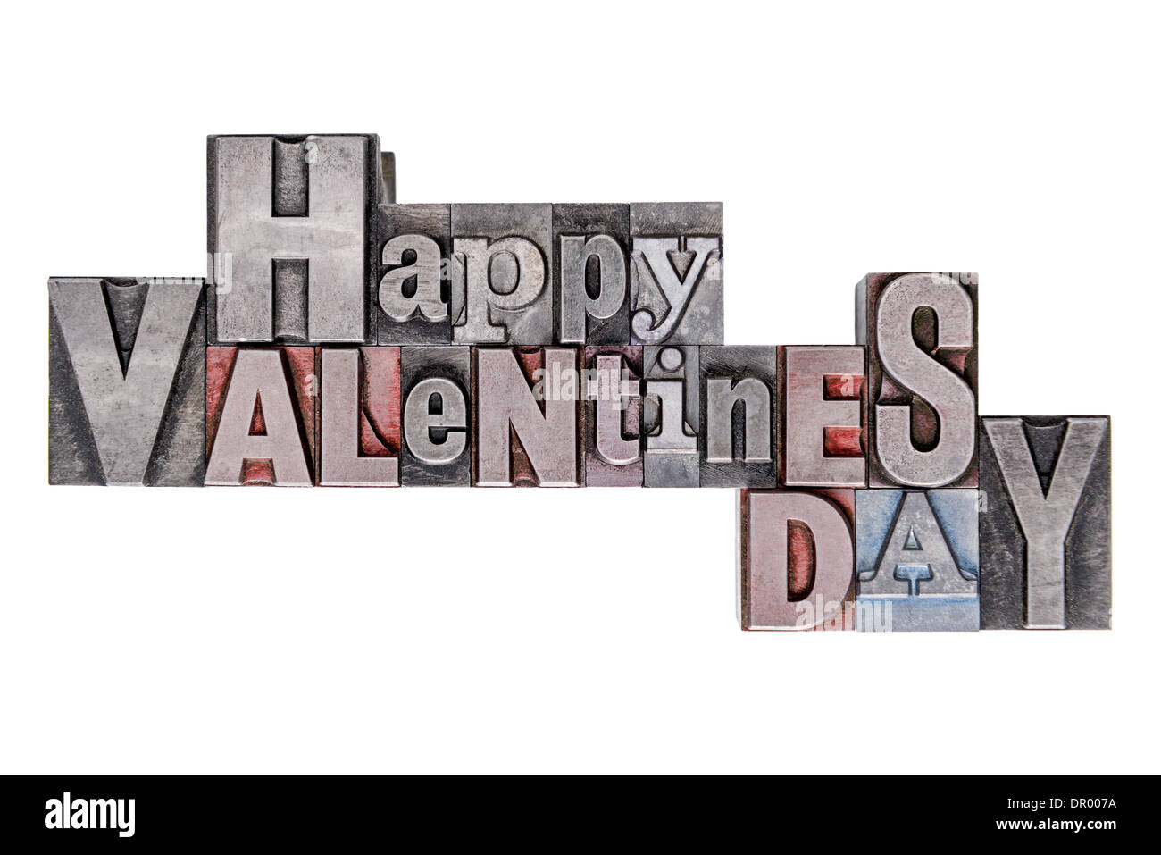 Happy Valentines Day text in old metal letterpress blocks with mixed font, isolated on a white background. Stock Photo