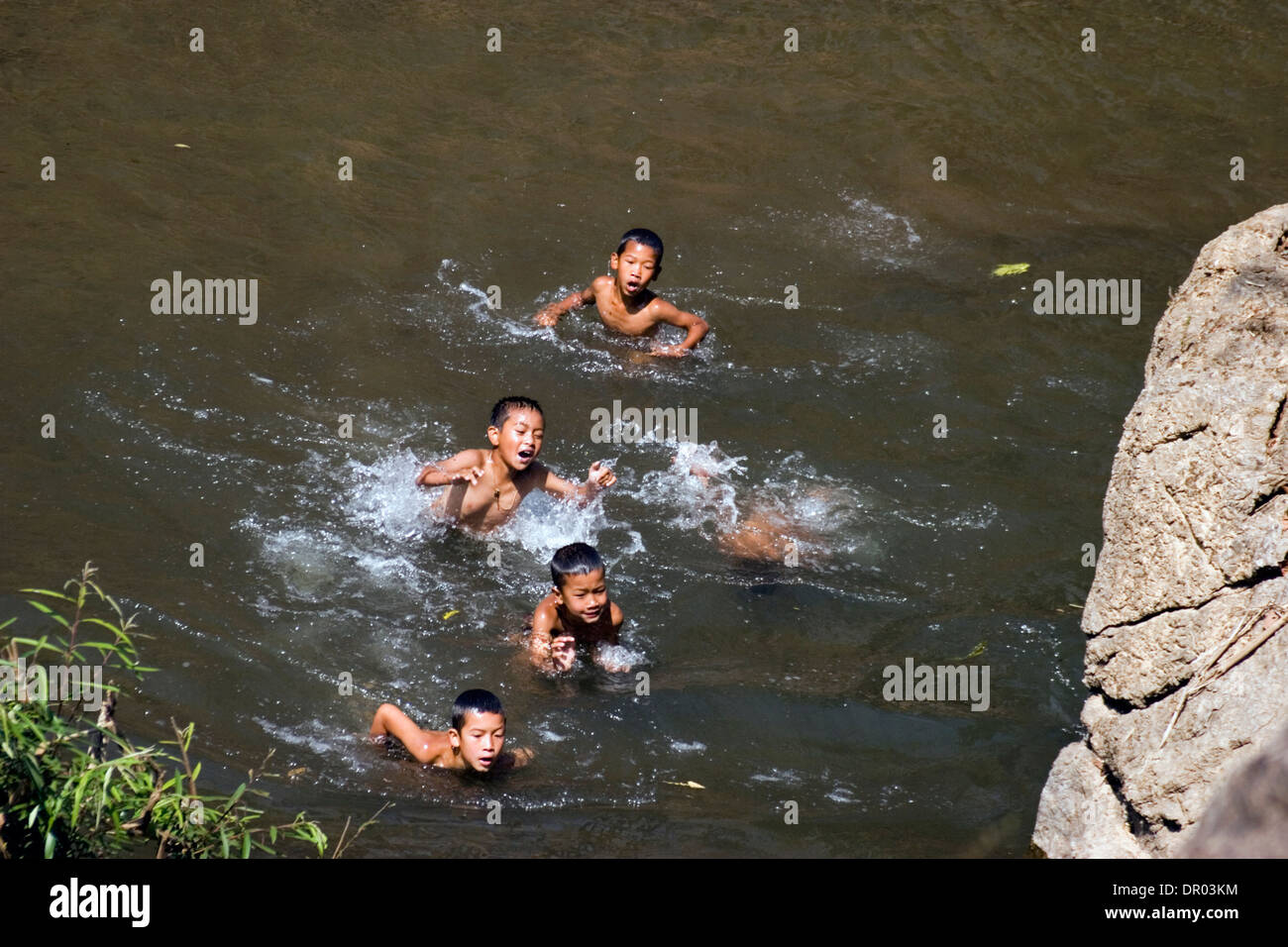 A group of young Asian boys are swimming in a beautiful river in Pang Ma  Pha, (Sappong) Thailand Stock Photo - Alamy