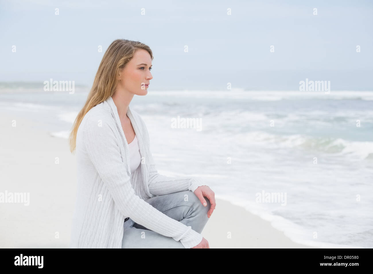 Female young kneeling thinking hi-res stock photography and images - Alamy
