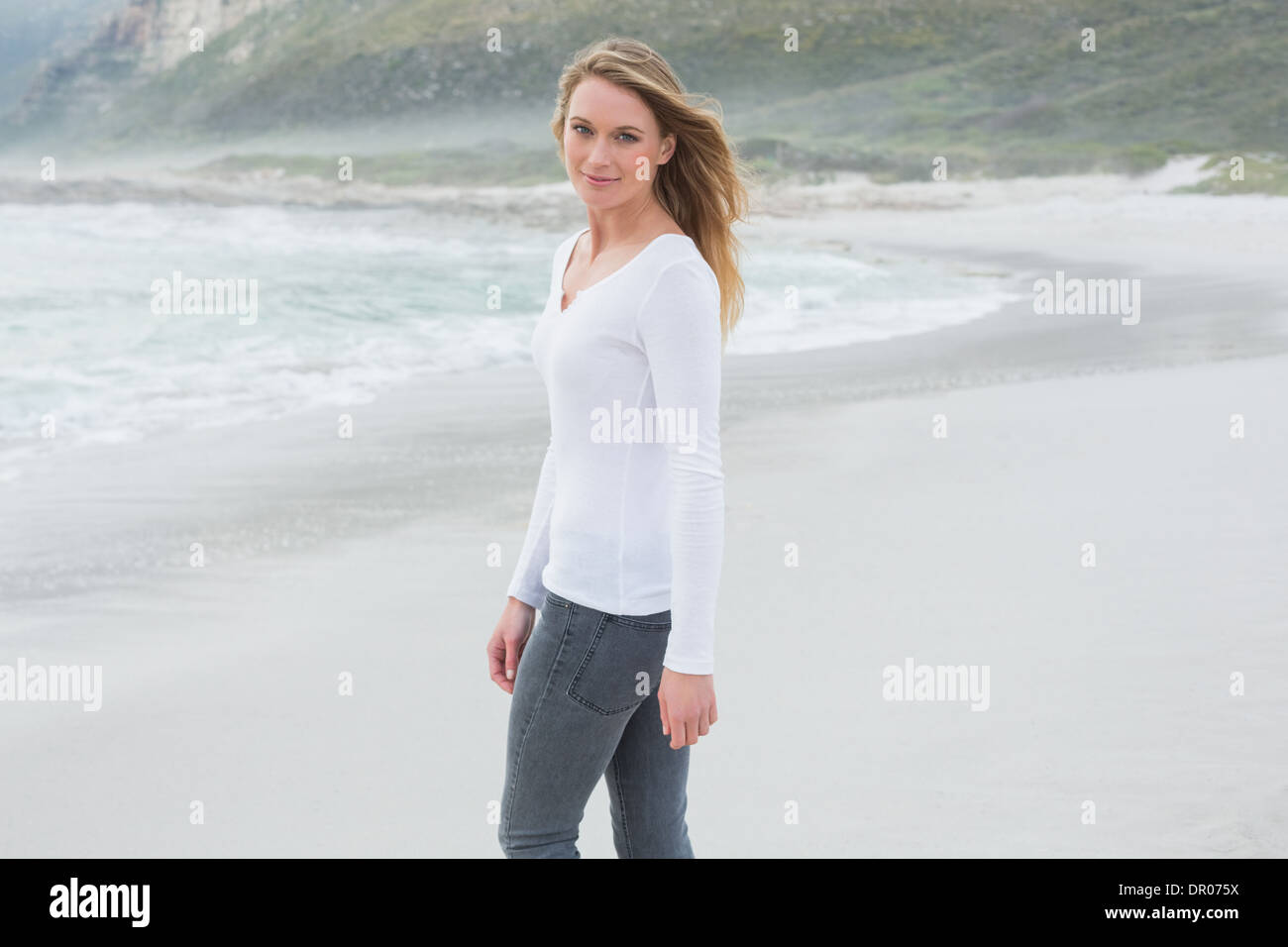 Pretty Young Girl Standing In Sea. Back Side To Camera Stock Photo, Picture  and Royalty Free Image. Image 5712697.
