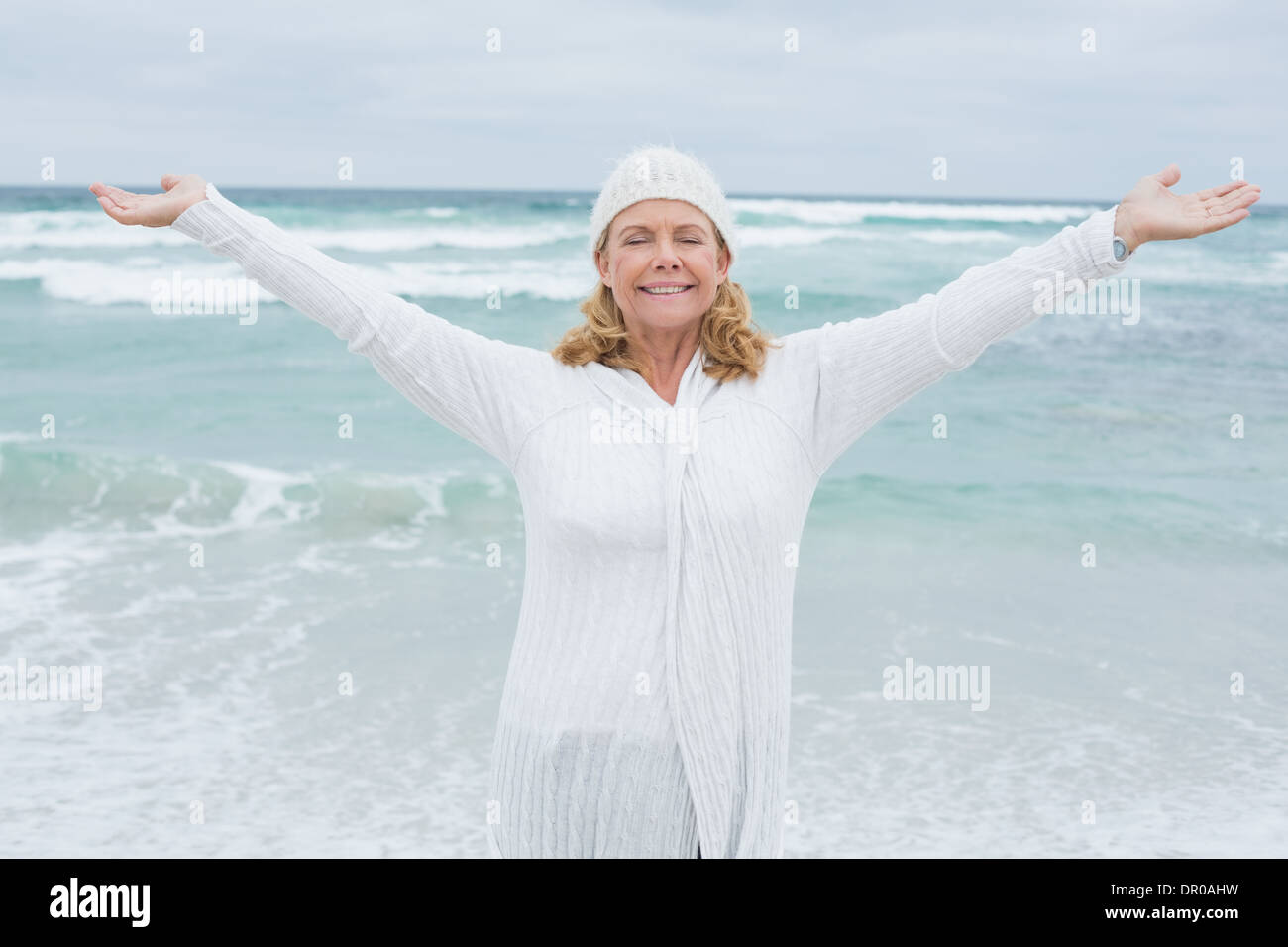 Mature woman beach arms hi-res stock photography and images - Alamy