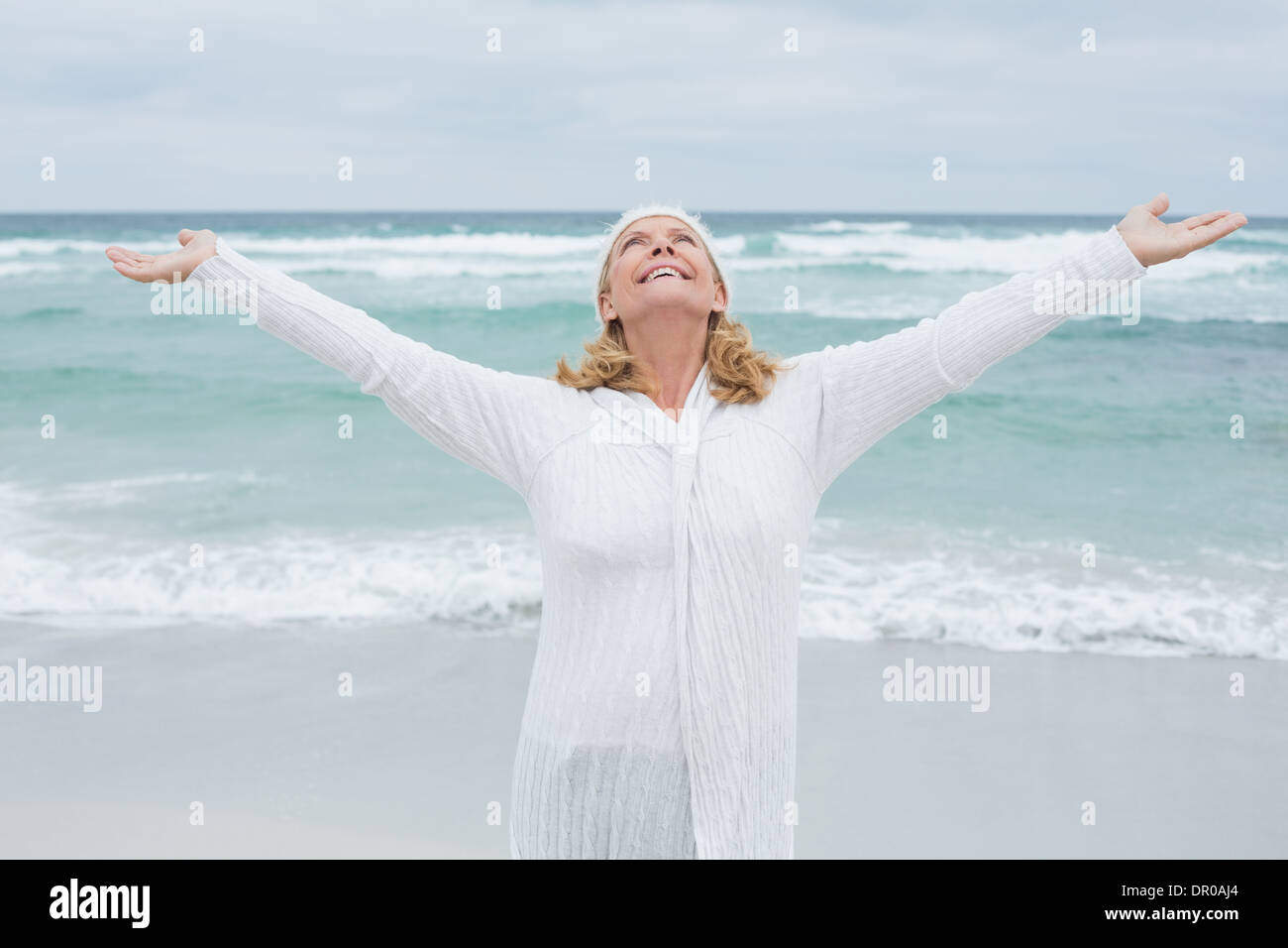 Senior woman arms outstretched hi-res stock photography and images - Alamy