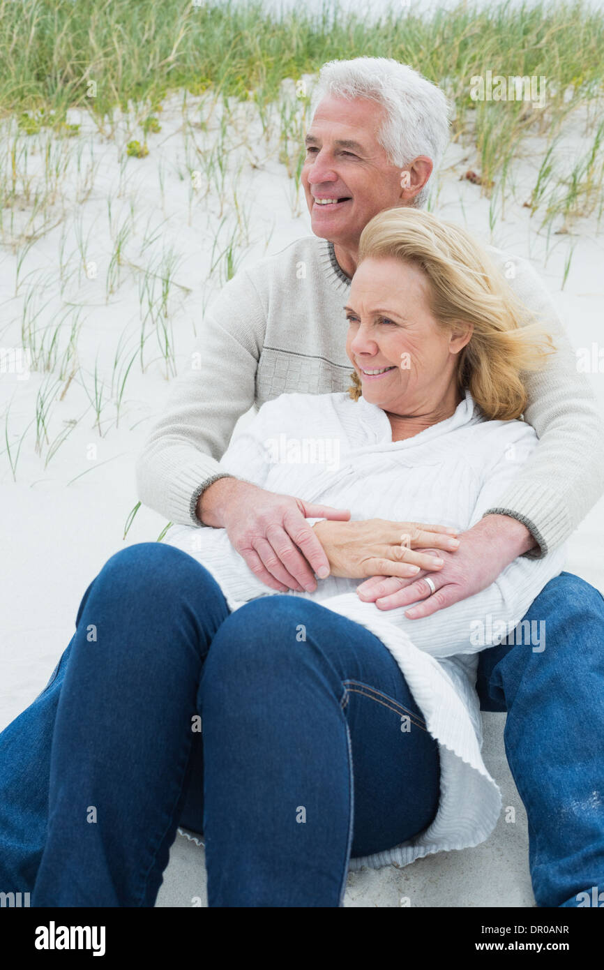 Romantic senior couple relaxing at beach Stock Photo - Alamy