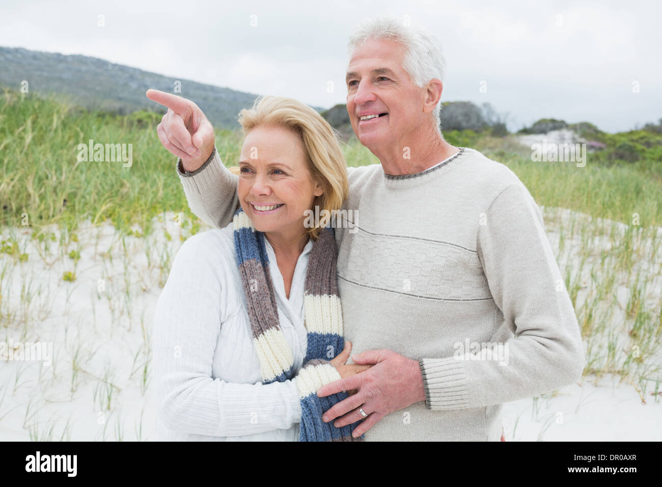 Cheerful romantic senior couple at beach Stock Photo