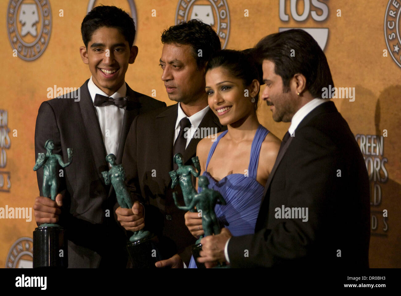 Jan 25, 2009 - Los Angeles, California, USA - Cast of 'Slumdog Millionaire' with the award for 'Outstanding Performance by a Cast in a Motion Picture' for 'Slumdog Millionaire' in the pressroom at the 15th Annual Screen Actors Guild Awards at the Shrine Auditorium in Los Angeles. (Credit Image: © Leopolda Pena/ZUMA Press) Stock Photo