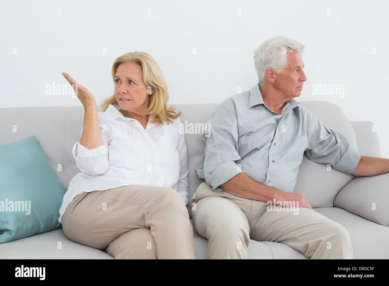 Displeased relaxed senior couple at home Stock Photo