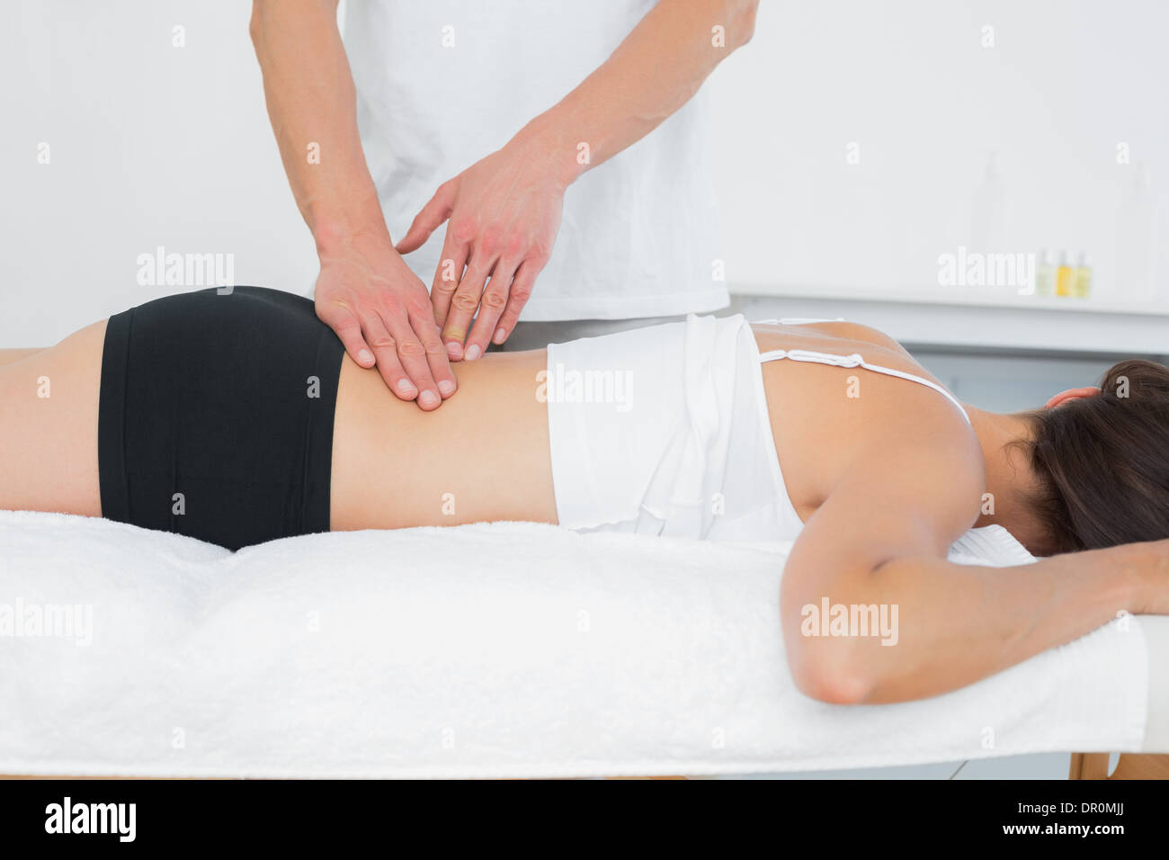 Lower back massage - Stock Image - C022/3243 - Science Photo Library
