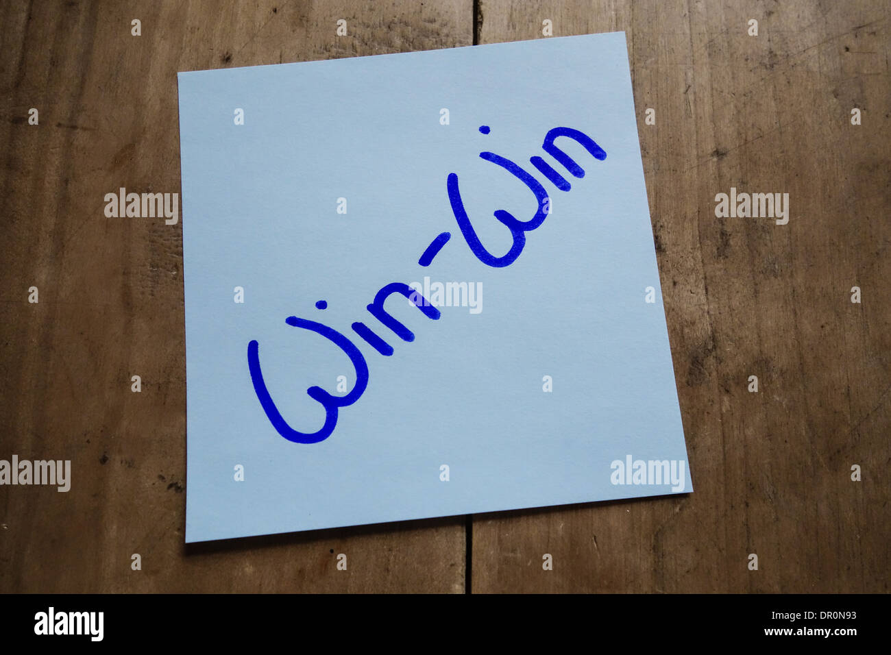Post it memo on wooden table, Win-Win Stock Photo