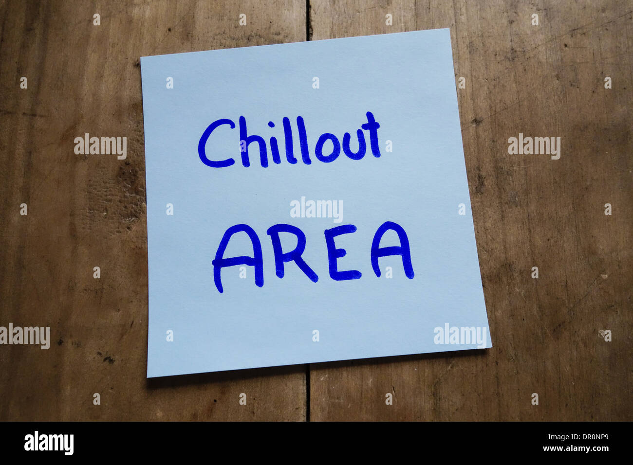 Post it memo on wooden table, Chillout Area Stock Photo