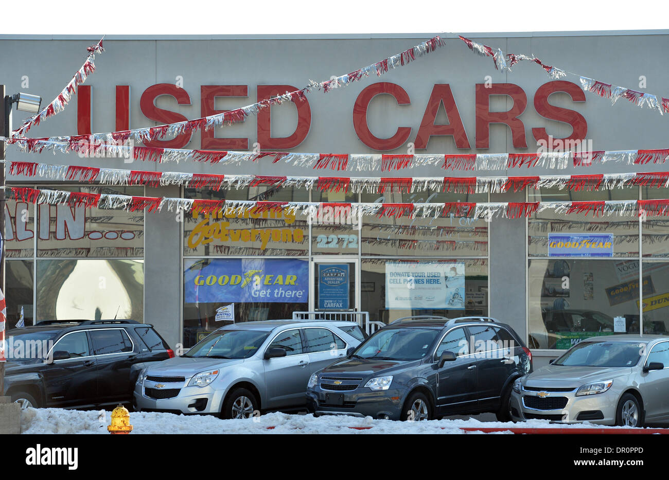 Detroit, USA. 12th Jan, 2014. A used car dealer with the logo 'Used Cars' pictured in the city centre of Detroit, United States of America, 12 January 2014. Photo: Uli Deck/dpa/Alamy Live News Stock Photo