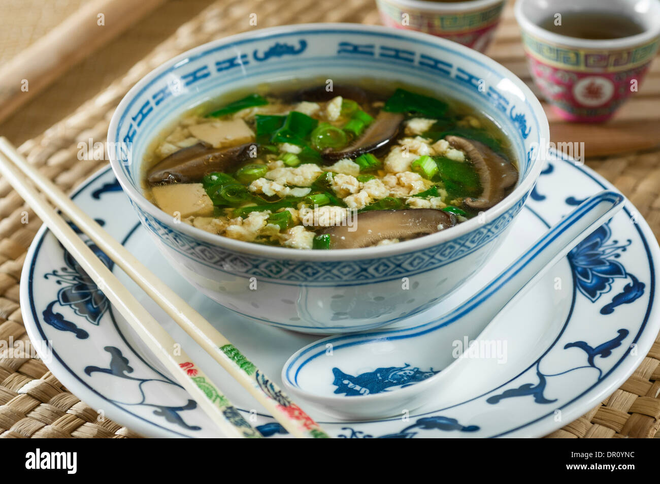 Egg drop soup with tofu and dried mushrooms. Chinese food Stock Photo