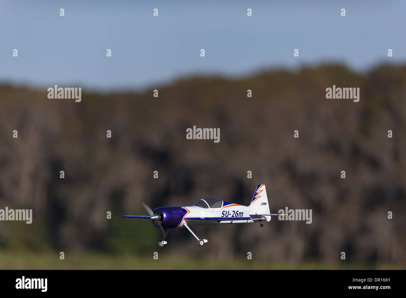 Remote Controlled Toy Plane in-flight. Stock Photo