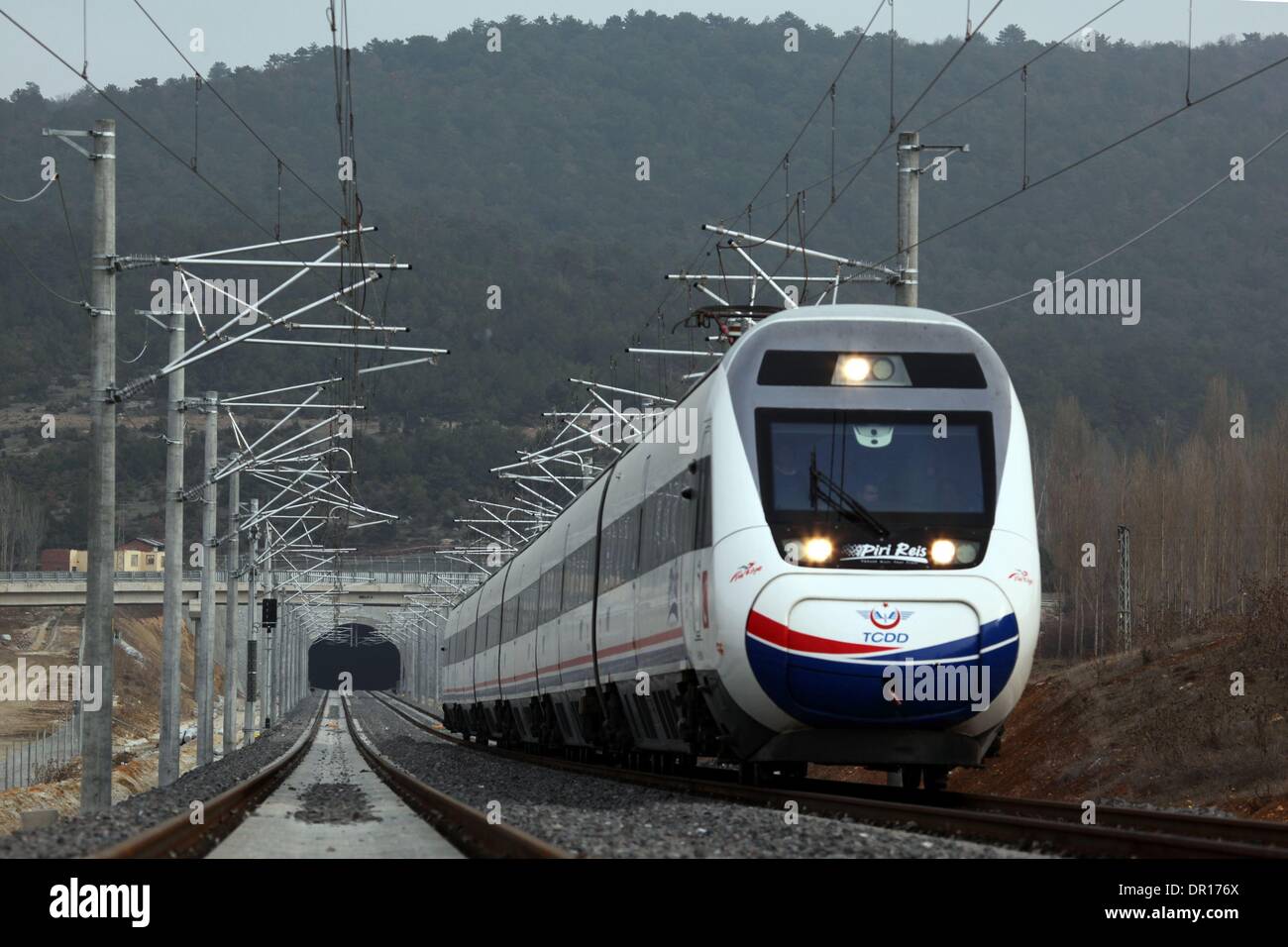 Turkey. 4th Jan, 2014. Photo taken on Jan. 4, 2014 shows a trial train take a test run on the Ankara-Istanbul high-speed railway constructed by China Railway Construction Corporation Limited (CRCC) in Turkey. Chinese railway department officals said on Jan. 4 that second phrase of the principal project of Ankara-Istanbul high-speed railway has been completed, marking the first of its kind in overseas market is about to open to traffic in a short term. © Liu Yu/Xinhua/Alamy Live News Stock Photo