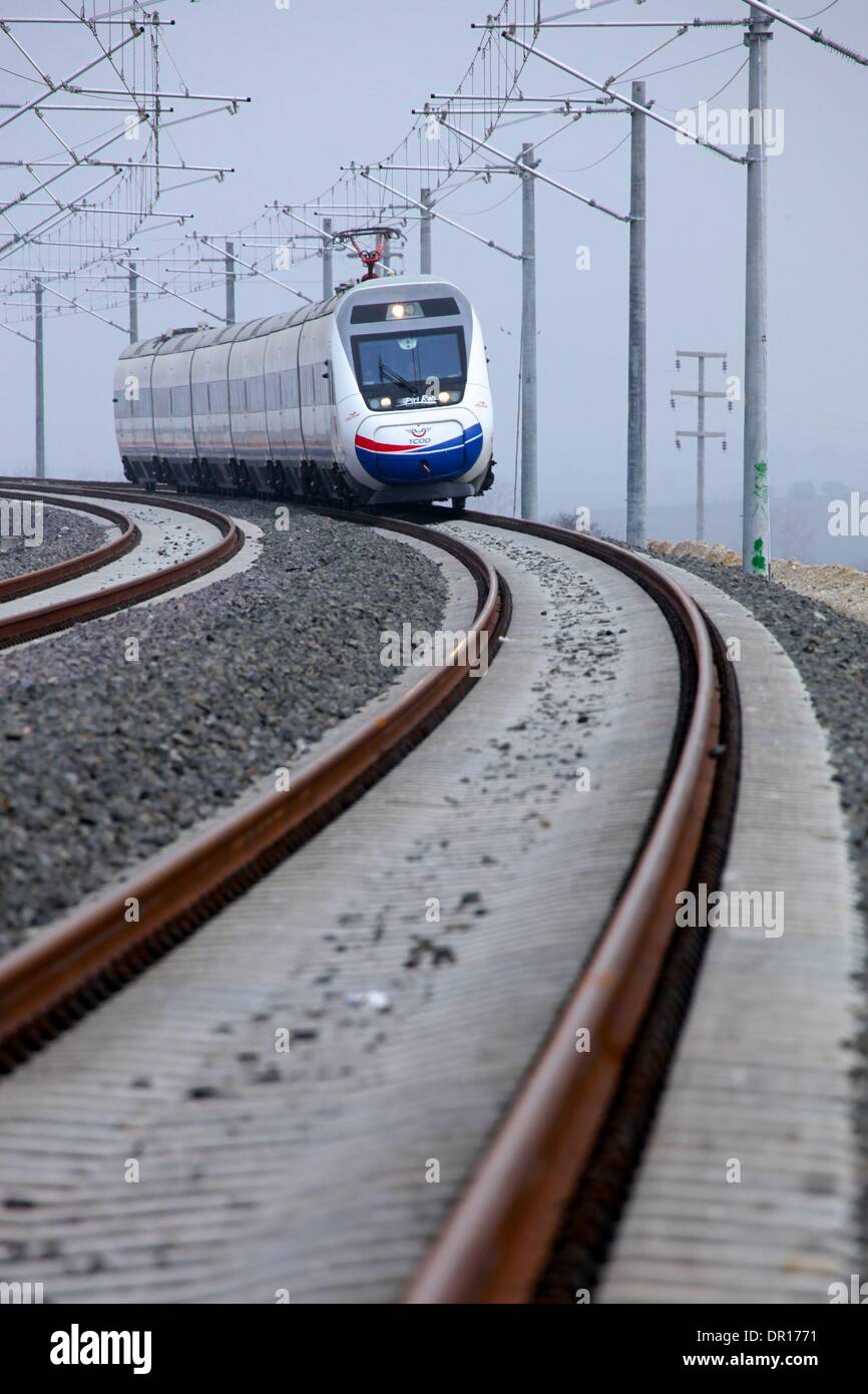 Turkey. 4th Jan, 2014. Photo taken on Jan. 4, 2014 shows a trial train take a test run on the Ankara-Istanbul high-speed railway constructed by China Railway Construction Corporation Limited (CRCC) in Turkey. Chinese railway department officals said on Jan. 4 that second phrase of the principal project of Ankara-Istanbul high-speed railway has been completed, marking the first of its kind in overseas market is about to open to traffic in a short term. © Liu Yu/Xinhua/Alamy Live News Stock Photo