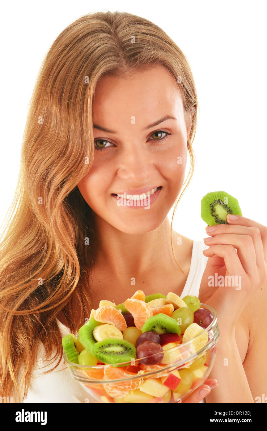 Young woman eating fruit salad Stock Photo Alamy