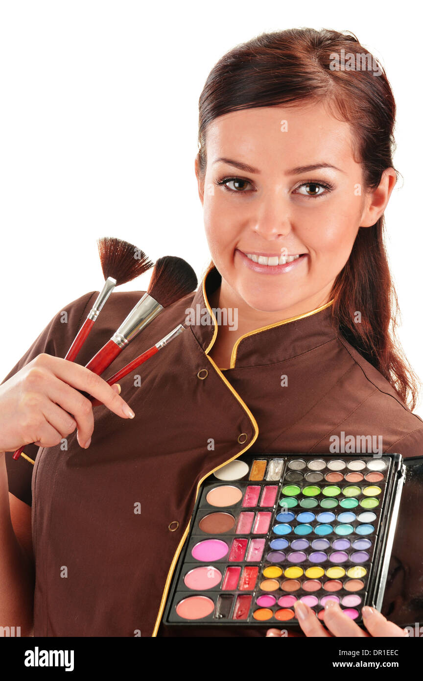 Professional beautician holding brushes Stock Photo