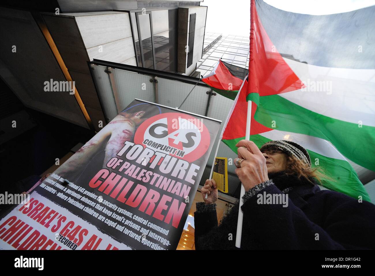 London, UK, UK. 17th Jan, 2014. Palestinians and supporters held a protest outside the G4S headquarters . G4S is a British-Danish security company that provides serves and equipment to Israeli prisons, checkpoints and patrols the Israel West Bank barrier. The group.alleges the security firm uses torture on its political prisoners. Credit:  Gail Orenstein/ZUMAPRESS.com/Alamy Live News Stock Photo