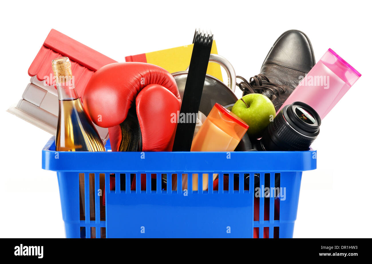 Variety of consumer products in plastic shopping basket isolated on white Stock Photo