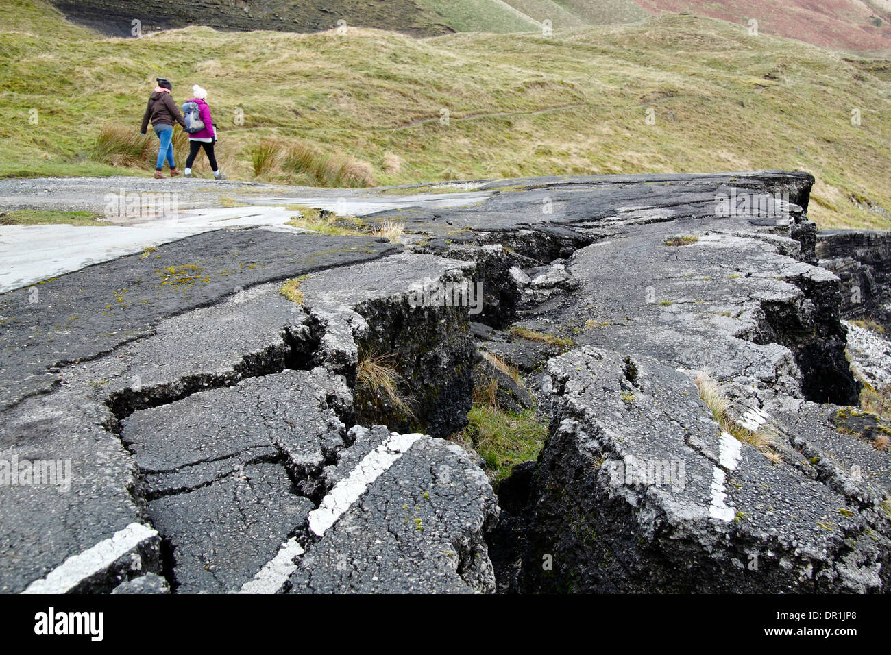 Walkers Cross The Landslide On The East Face Of Mam Tor Near Castleton walkers-cross-the-landslide-on-the-east-face-of-mam-tor-near-castleton