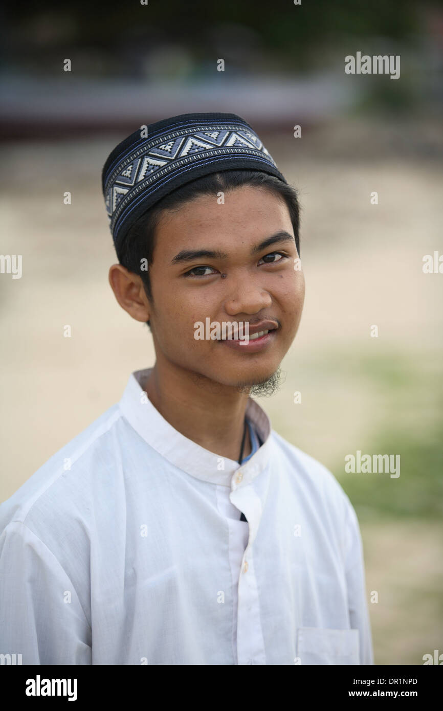 Smiling teenage Muslim teenage boy from Kupang, West Timor, Indonesia Stock Photo