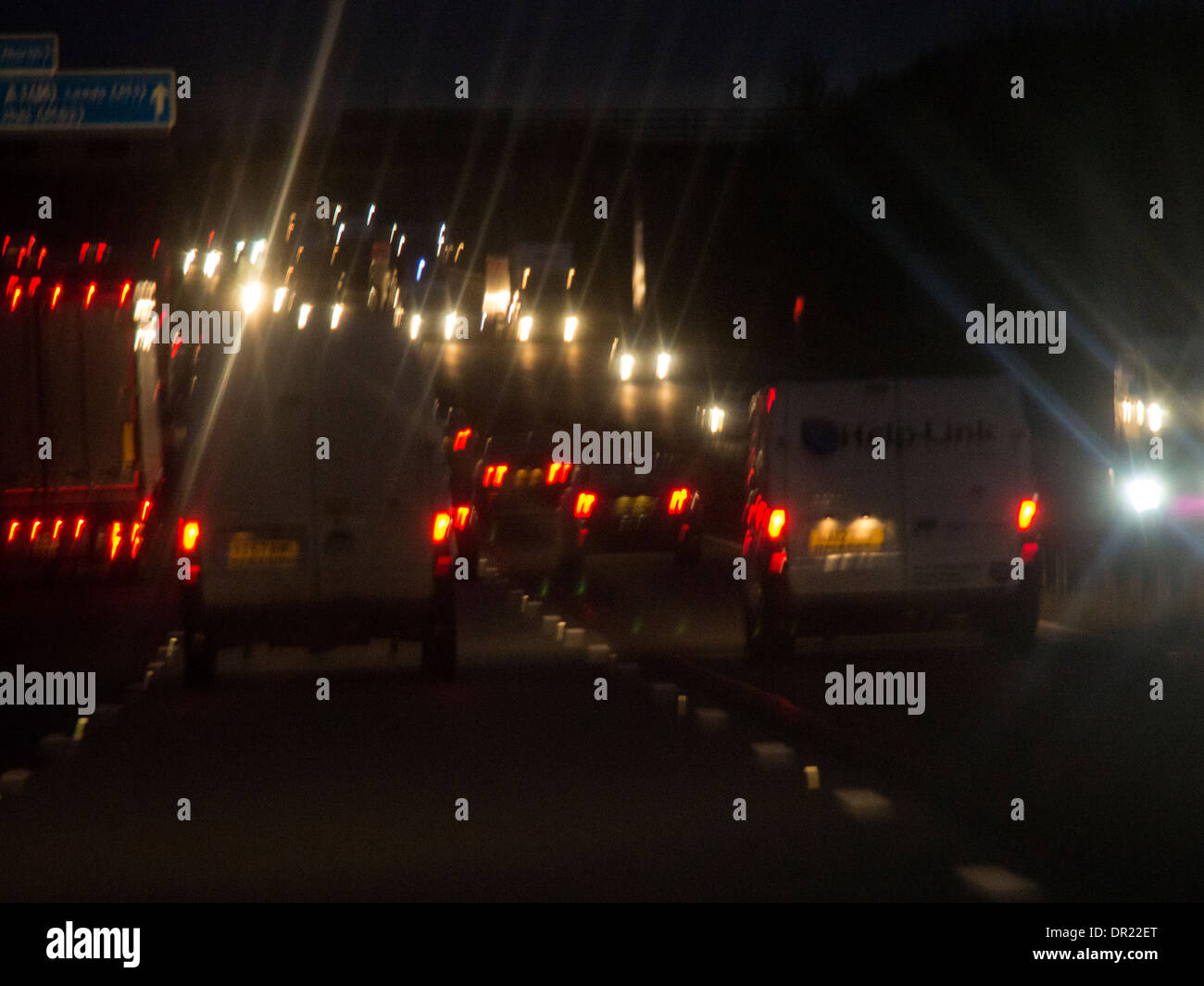 Lorries on motorway at night hi-res stock photography and images - Alamy