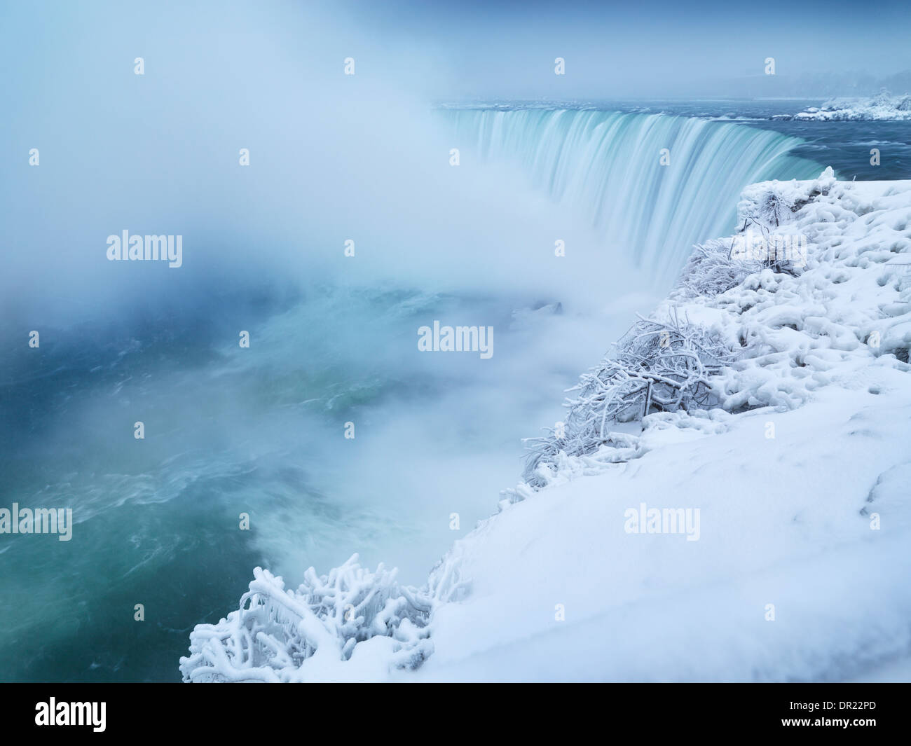 Niagara Falls Horseshoe waterfall covered with snow, wintertime scenic. Ontario, Canada. Stock Photo
