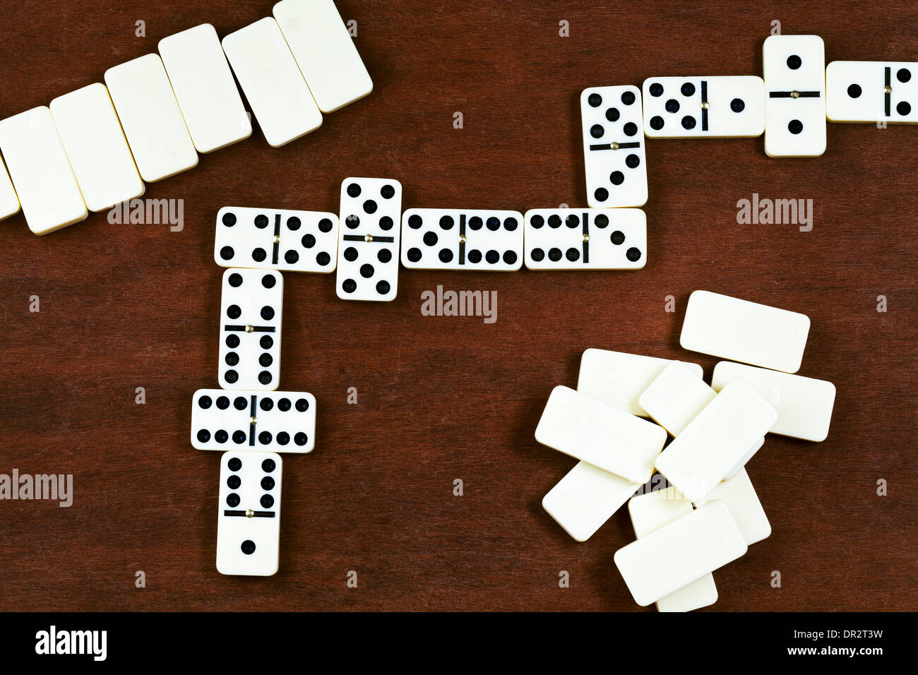 top view of dominoes playing on wooden table Stock Photo