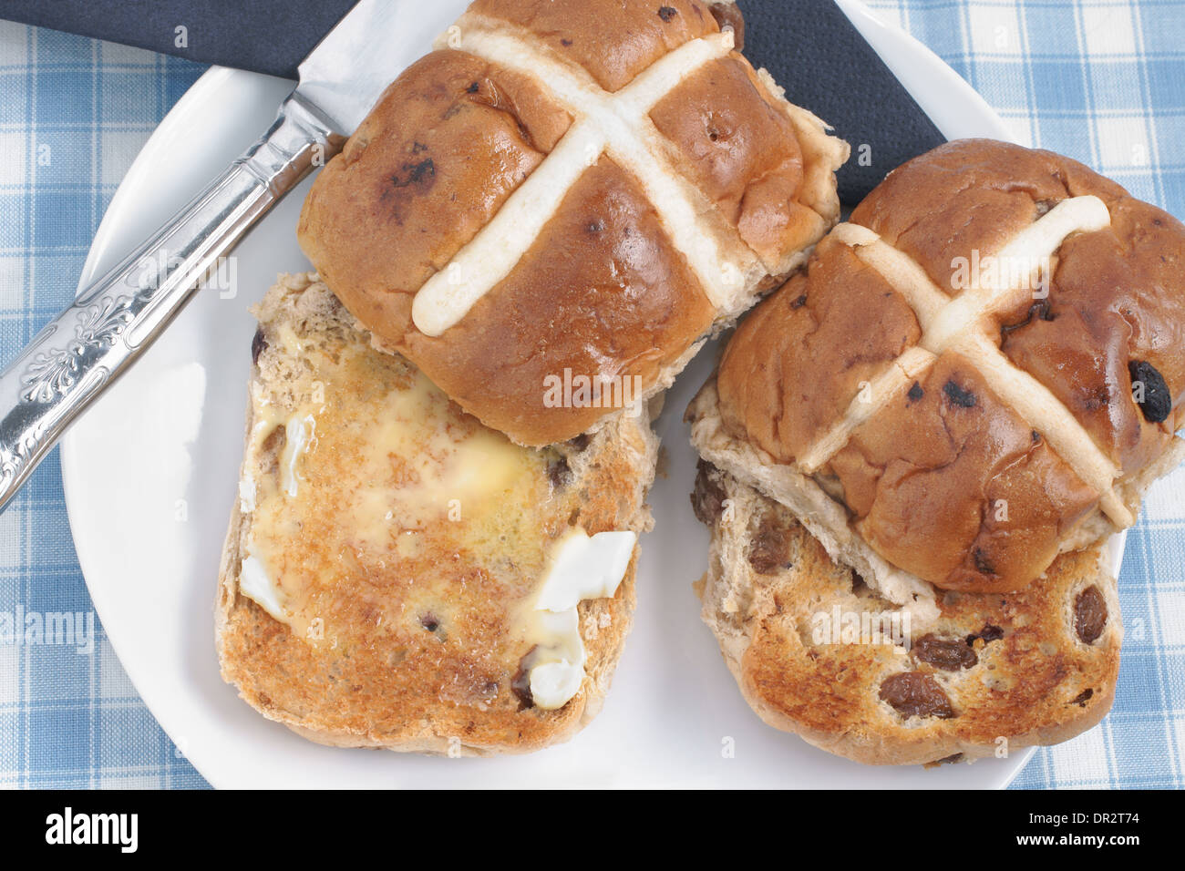 Hot Cross Buns toasted and buttered Stock Photo Alamy