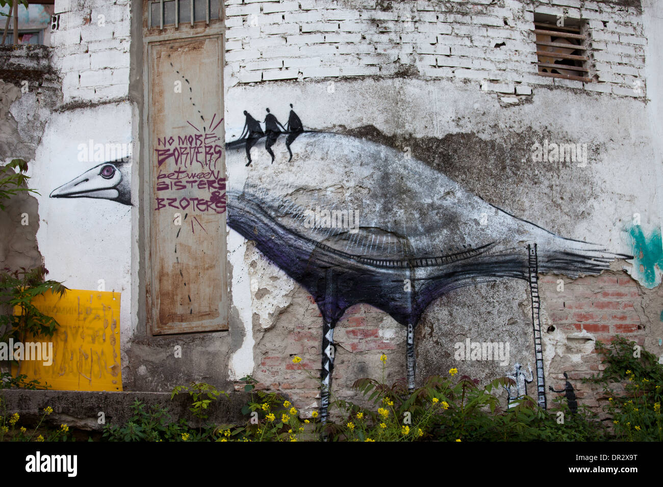 Big bird graffiti in Seville, Spain. Stock Photo