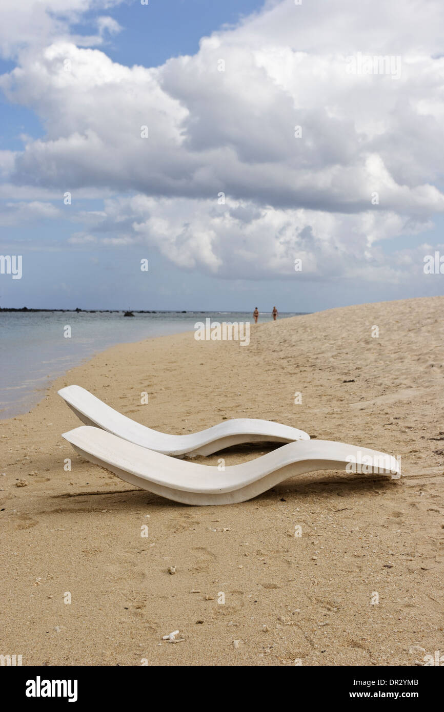 Modern recliners seats on La Preneuse beach, Mauritius Stock Photo Alamy