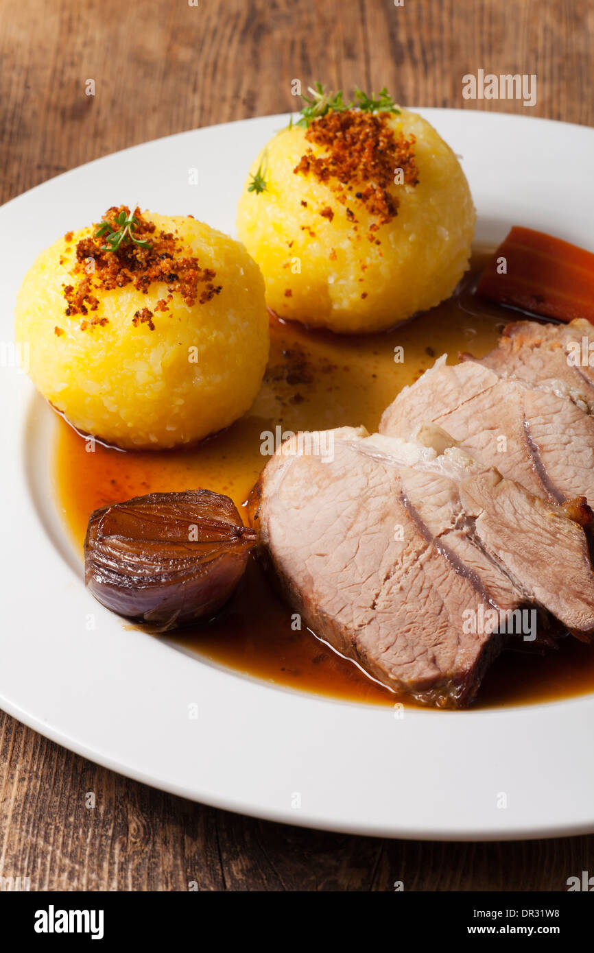 bavarian roasted pork and potato dumplings Stock Photo Alamy