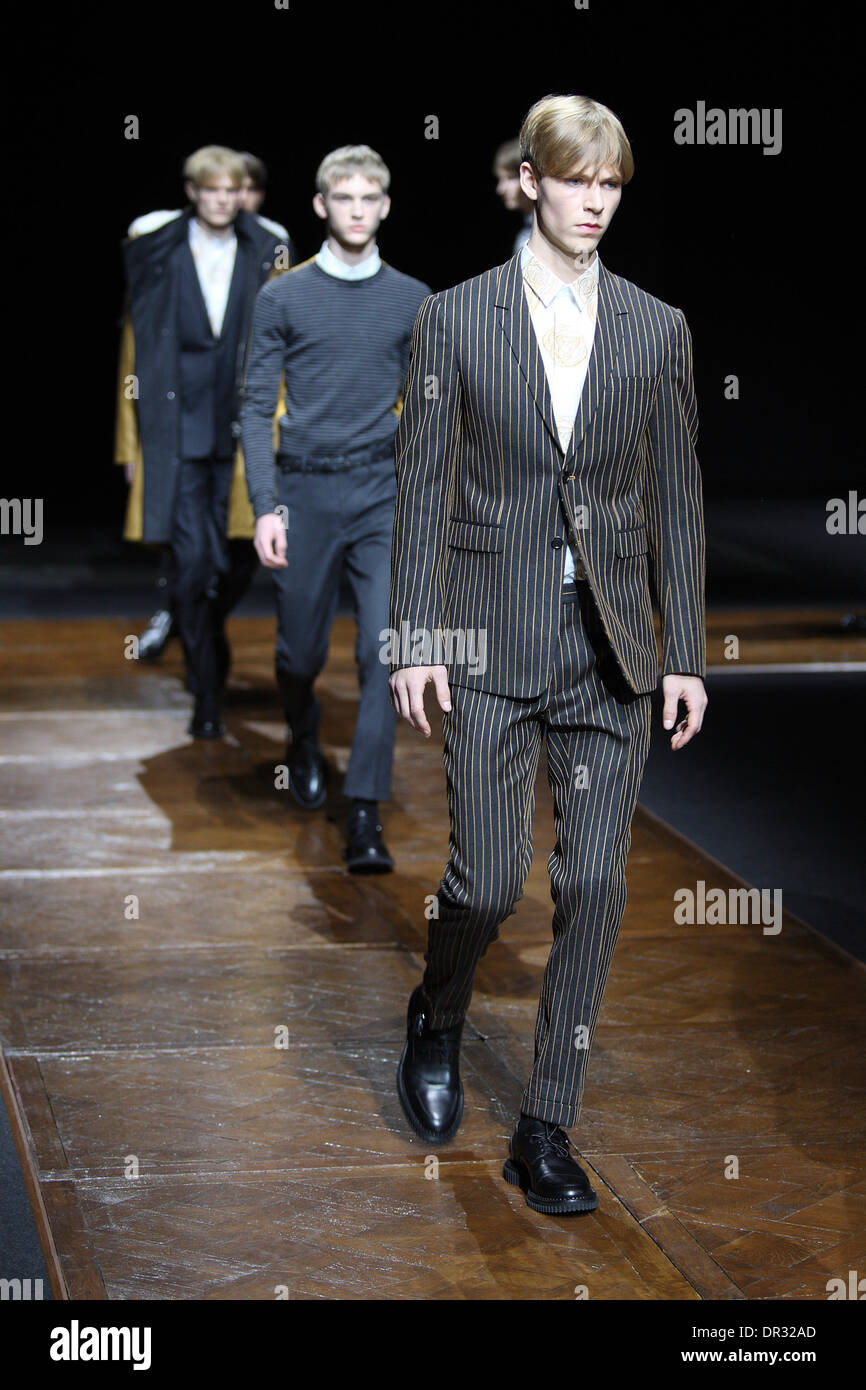 Paris, France. 18th Jan, 2014. Models wear creations by Belgian designer  Kris Van Assche as part of Dior fall/winter 2014/2015 collection presented  during the Paris Homme mens' fashion week, in Paris, France,