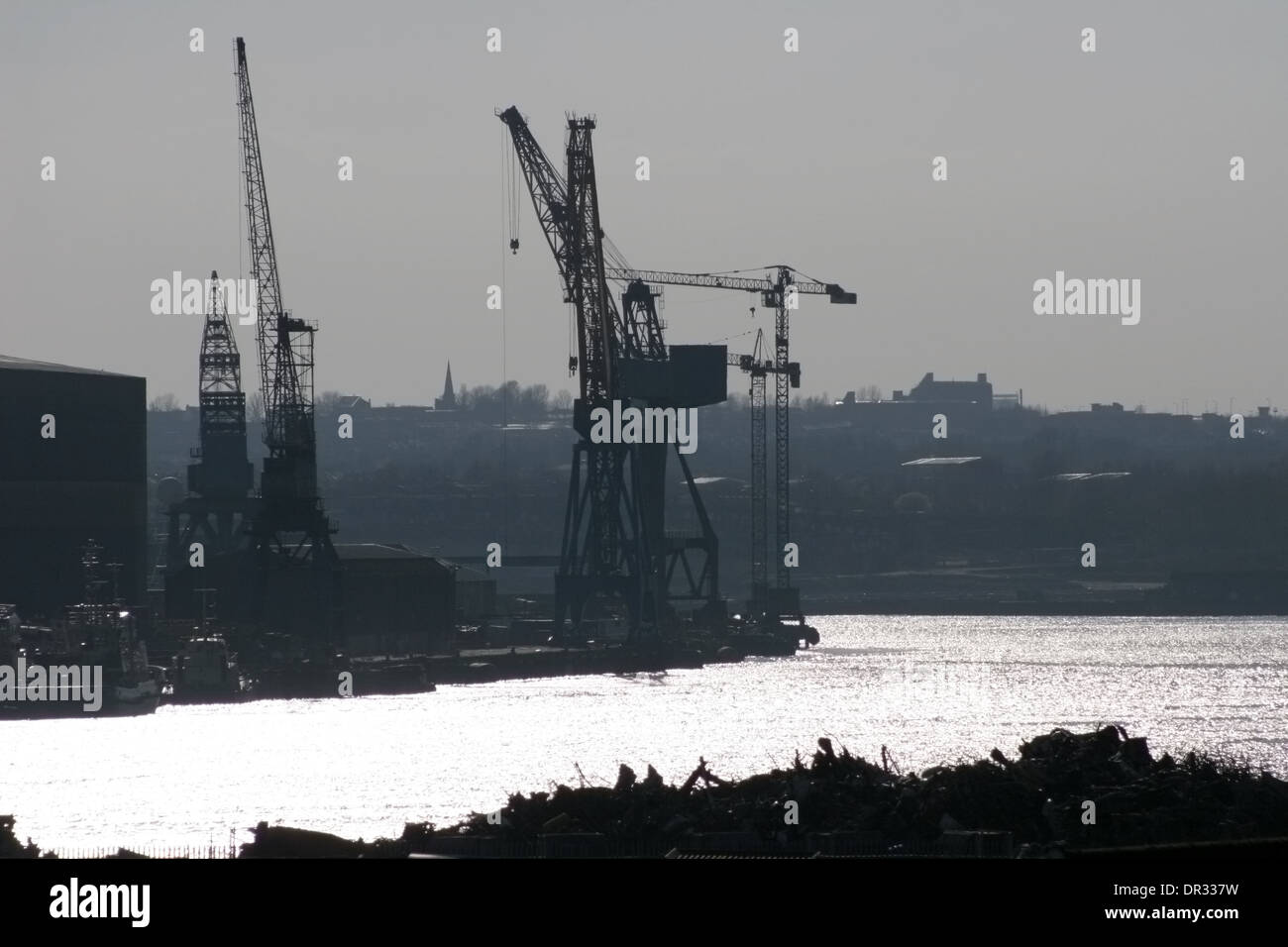 View towards historic ship building cranes on the banks of the river Tyne Stock Photo
