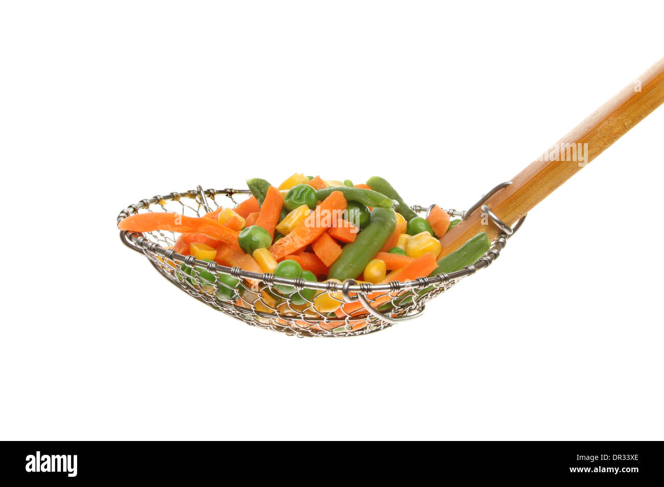 Mixed vegetables in a sieve isolated against white Stock Photo