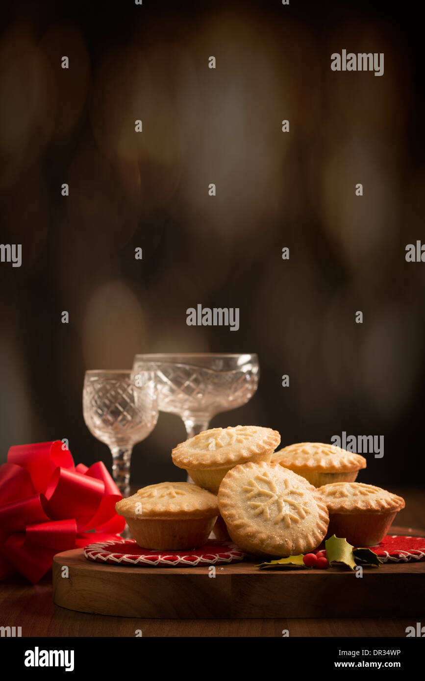 Homemade Christmas mince pies with festive background Stock Photo - Alamy