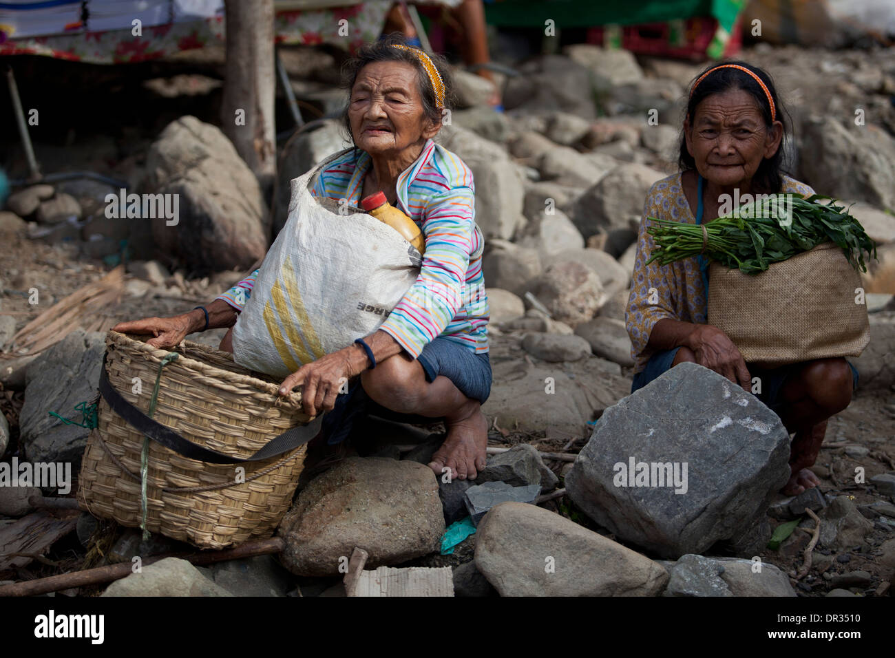 Elder Hanunoo Mangyan women at rest while attending a Mangyan market