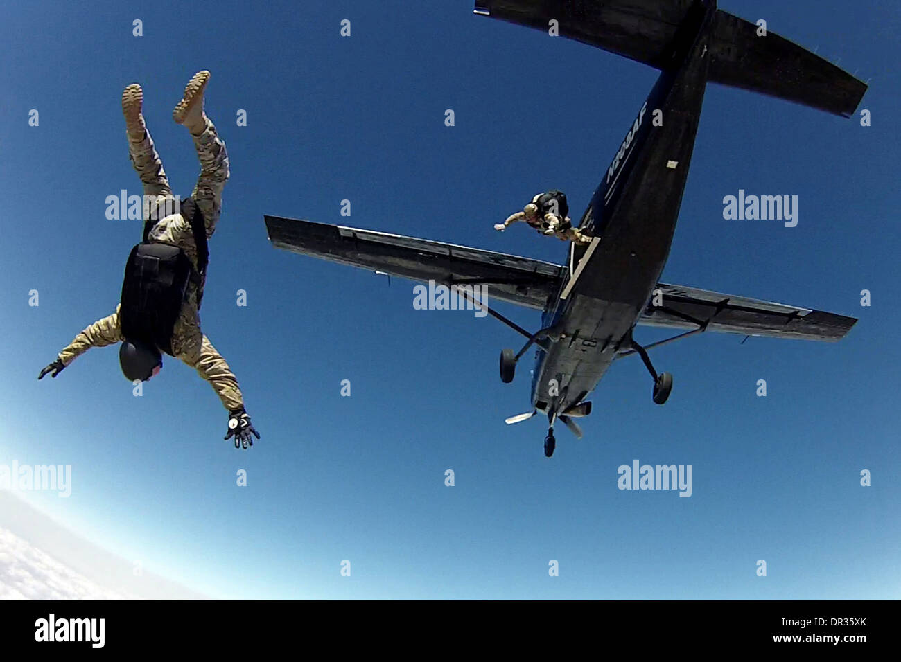 Military free fall jump Stock Photo