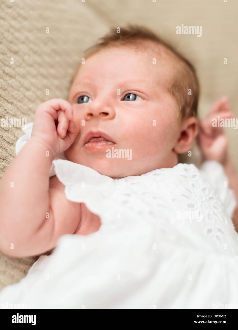 Newborn girl with opened eyes Stock Photo Alamy