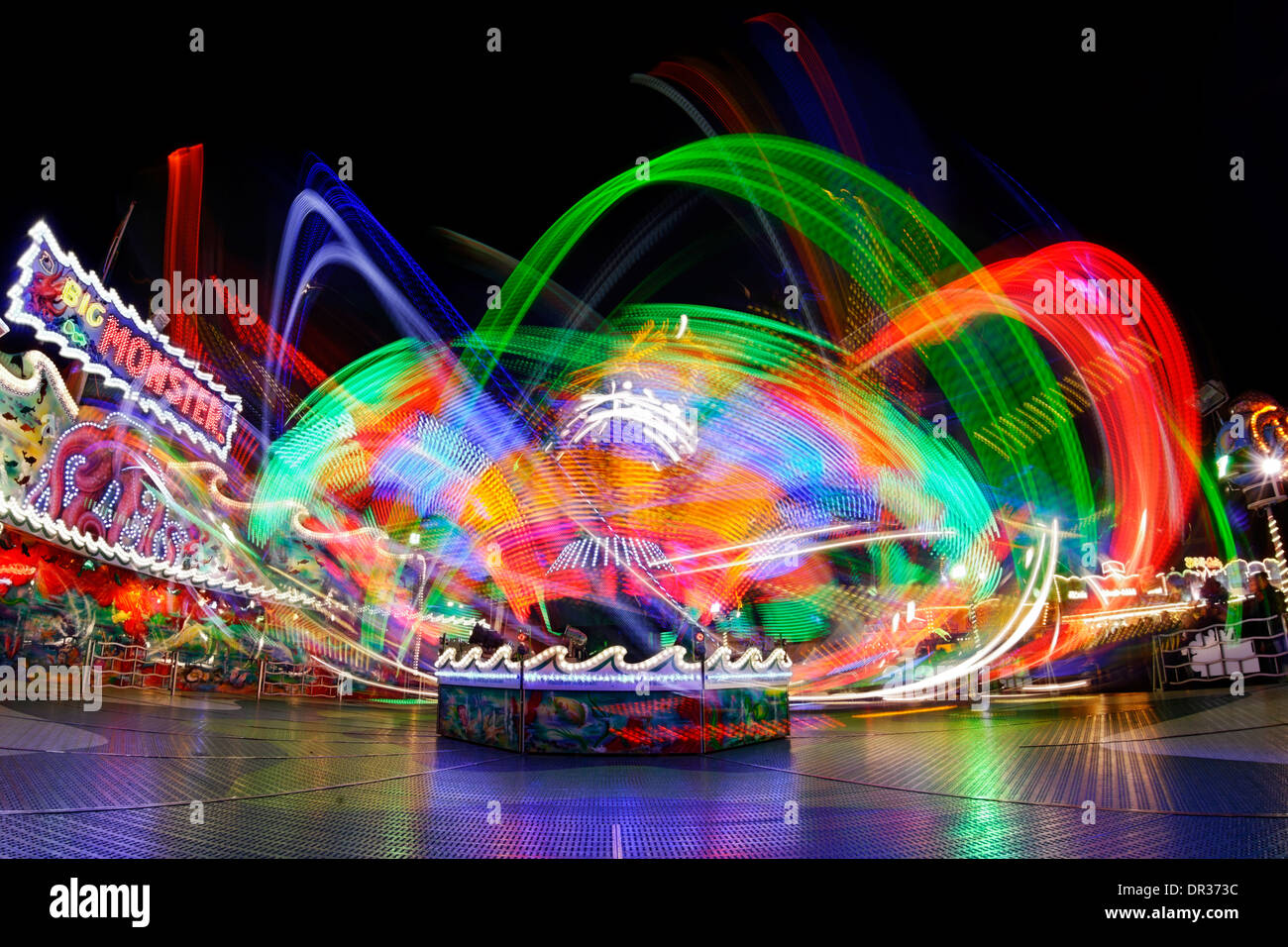 Dynamic light traces of an carousel Stock Photo