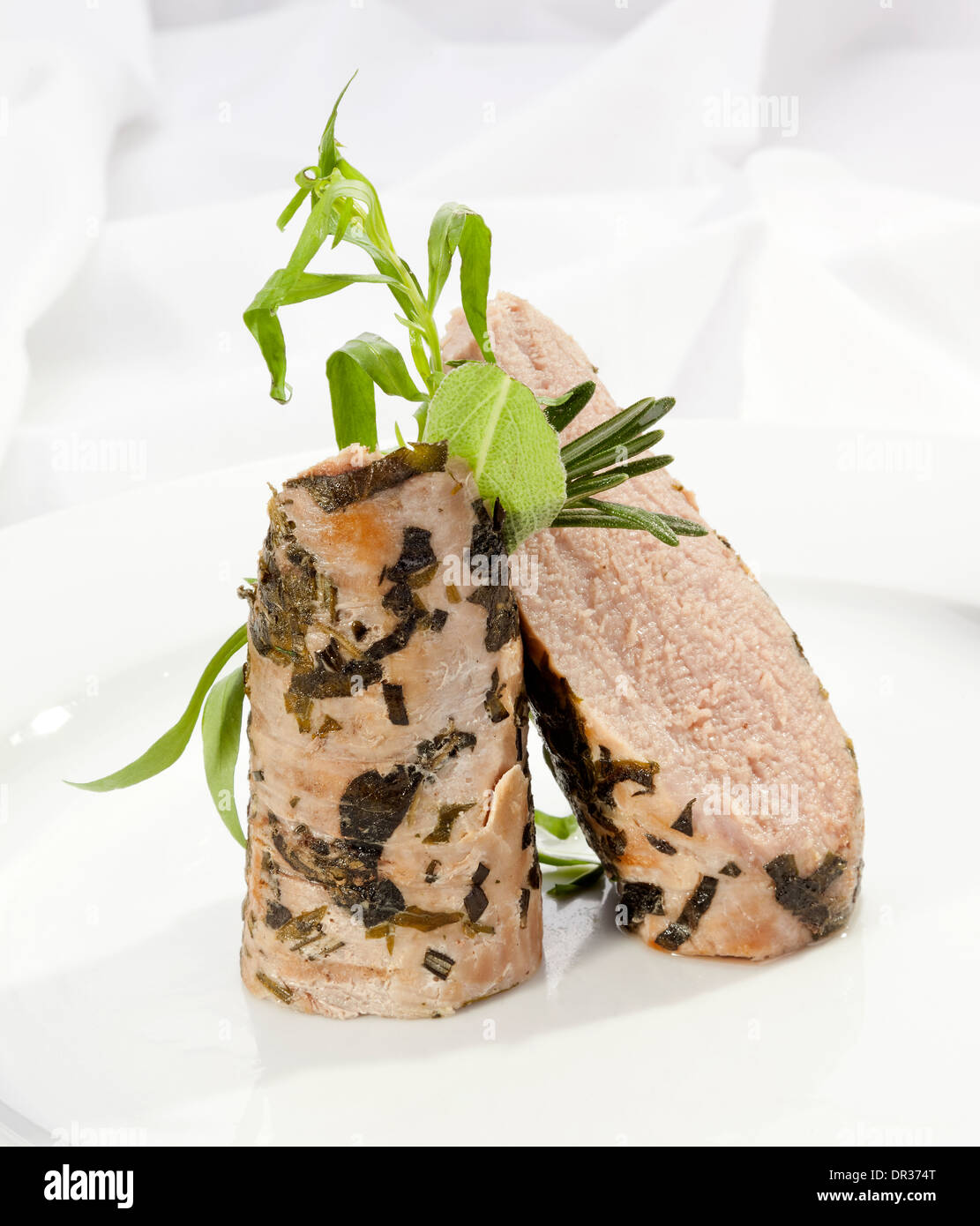 Grilled Sirloin with fresh green herbs Stock Photo