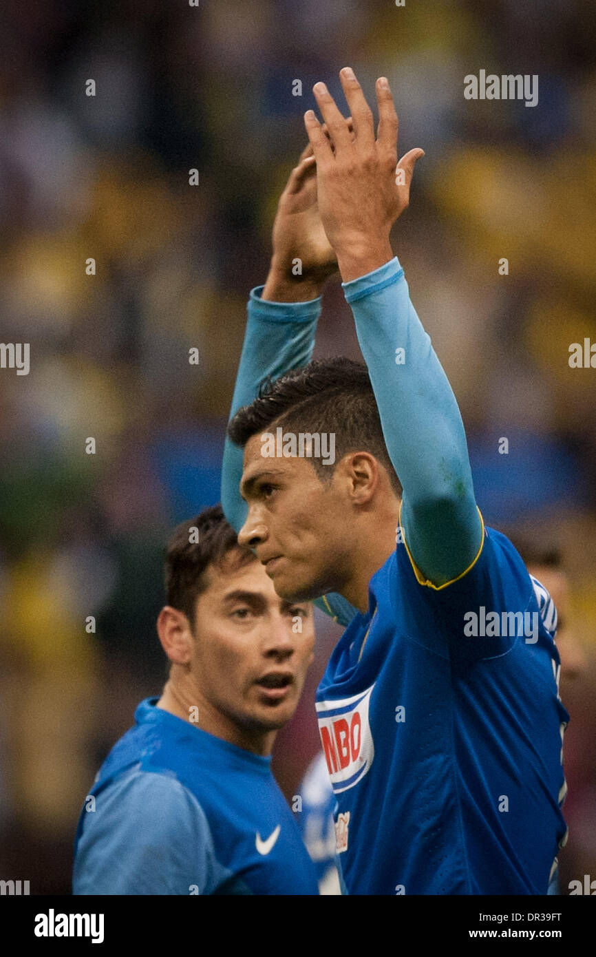 Mexico City, Mexico. 19th Jan, 2014. America's Raul Jimenez (R) celebrates after scoring during the match of the MX League Closing Tournament 2014, against Leon, in Mexico City, capital of Mexico, on Jan. 18, 2014. Credit:  Pedro Mera/Xinhua/Alamy Live News Stock Photo