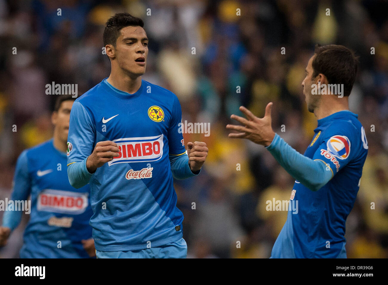 Mexico City, Mexico. 19th Jan, 2014. America's Raul Jimenez (C) celebrates after scoring during the match of the MX League Closing Tournament 2014, against Leon, in Mexico City, capital of Mexico, on Jan. 18, 2014. Credit:  Pedro Mera/Xinhua/Alamy Live News Stock Photo
