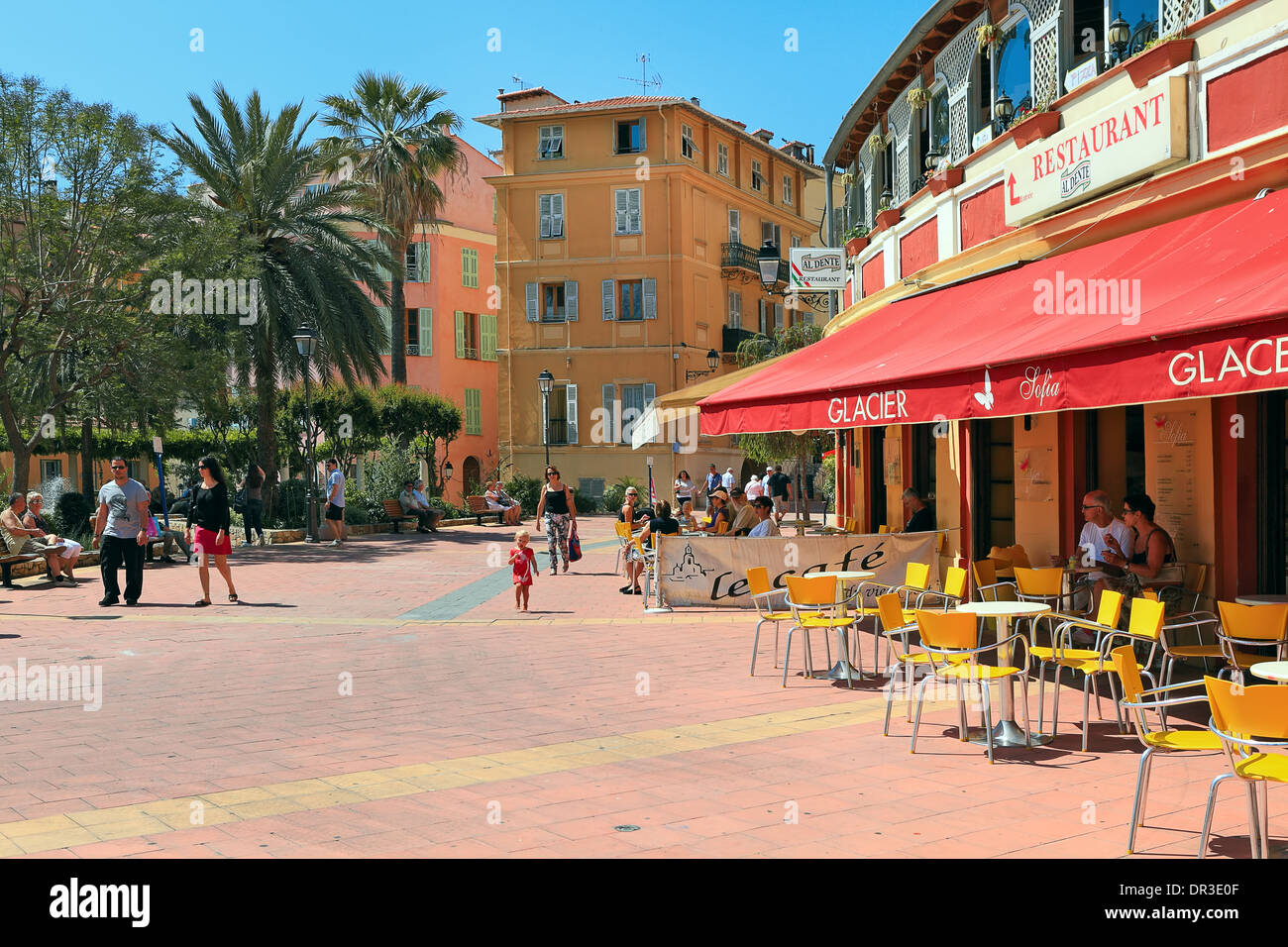 Small square at the center of old town with bars and restaurants in town of Menton, France. Stock Photo